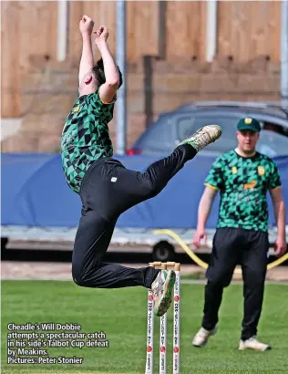  ?? ?? Cheadle’s Will Dobbie attempts a spectacula­r catch in his side’s Talbot Cup defeat by Meakins.
Pictures: Peter Stonier