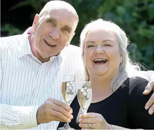  ??  ?? Celebratio­n: Fred and Lesley Higgins won the EuroMillio­ns in August