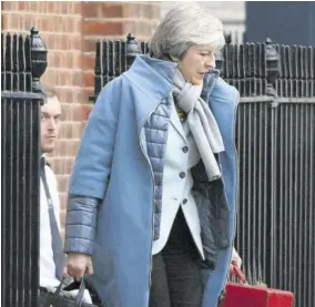  ??  ?? Britain’s Prime Minister Theresa May leaves 10 Downing Street in London, yesterday. Talks to end Britain’s Brexit stalemate appeared deadlocked yesterday, with neither Prime Minister Theresa May nor the main opposition leader shifting from their entrenched positions.