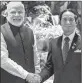  ??  ?? PM Modi shakes hands with Myanmar President Win Myint.