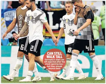  ??  ?? CAN STILL WALK TALL Germany’s stars are left dejected after the shock opening loss – but they should bounce back