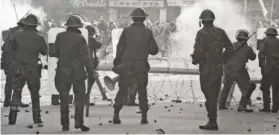  ??  ?? Clash: Soldiers face protesters in Londonderr­y on Bloody Sunday