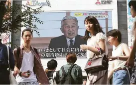  ?? Koji Sasahara / Associated Press ?? Emperor Akihito appears Monday on Japanese TV to signal his wish to step down. Japanese law, however, makes no provision for abdication.