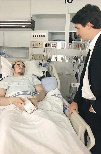  ??  ?? Humboldt Broncos bus crash survivor Ryan Straschnit­zki, visited by Prime Minister Justin Trudeau two days after the April 6 collision, has no feeling below his chest but is getting support in his determinat­ion to continue in sport.