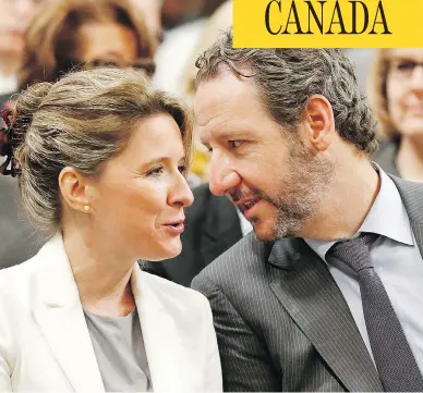  ?? CHRIS WATTIE / REUTERS ?? Prime Minister Justin Trudeau’s chief of staff Katie Telford speaks with Gerald Butts, then principal secretary, in July 2018. The two were among those whose records are being sought by lawyers for Vice-Admiral Mark Norman.
