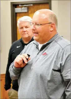  ?? TIMES photograph by Annette Beard ?? Tony Travis, named athletic director Monday, introduced Jeff Williams, as the head Blackhawk football coach.