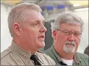  ??  ?? Butte County Sheriff Kory Honea, left, answers a question on Feb. 14 as Bill Croyle, acting director of the Department of Water Resources, looks on during a news conference in Oroville.