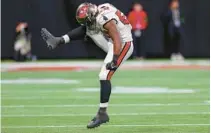  ?? KEVIN C. COX/GETTY ?? K.J. Britt, who had eight tackles and one pass defensed last weekend in Atlanta, rejoices during the Bucs’ 29-25 victory.