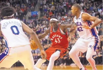  ?? ASSOCIATED PRESS ?? Toronto’s Pascal Siakam, a New Mexico State alum, was the Raptors’ high scorer with 25 points in a victory over Philadelph­ia on Monday night.