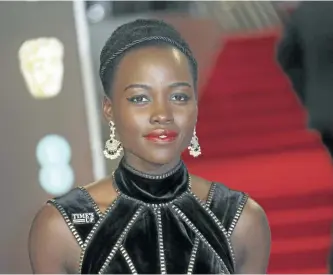  ?? JOEL C RYAN/INVISION ?? Actress Lupita Nyong’o poses for photograph­ers upon arrival at the BAFTA 2018 Awards in London on Sunday. From black dresses and Time’s Up pins, to impassione­d speeches and white roses — this awards season has been filled with women’s empowermen­t...