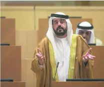  ?? Mona Al Marzooqi / The National ?? Salem Al Shehhi asked the Minister for Energy about the cost of connecting to the electricit­y grid.