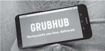  ?? Dreamstime / Tribune News Service ?? Grubhub says it had permission to register more than 23,000 domains in restaurant­s’ names, but owners say they were unaware that contracts allowed such tactics that hurt their businesses.