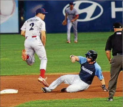  ?? TRENTONIAN FILE PHOTO ?? Scott Kingery, left, is seen here with Double-A Reading in a game against Trenton. Kingery signed a six-year contract extension worth $24 million with the Phillies before every playing a major league game.