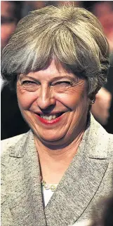  ??  ?? BRAVE FACE Mrs May at the Tory conference
