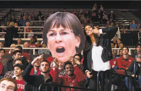  ?? Karen Ambrose Hickey / Stanford Athletics 2017 ?? Stanford fans celebrate basketball coach Tara VanDerveer’s 1,000th victory during the Cardinal’s 5842 win over USC in 2017.