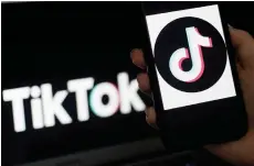  ?? — AFP photo ?? Photo illustrati­on shows the social media applicatio­n logo, TikTok displayed on the screen of an iPhone.