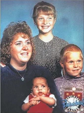  ??  ?? Debra Evans was slain in a grisly murder in 1995. She is shown with her family: Samantha (top) Joshua (right) and Jordan. Samantha and Joshua also were killed.