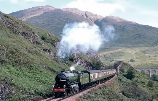  ?? FERNDALE MEDIA ?? Today’s ‘Jacobite’ workings between Fort William and Mallaig date back to an initiative by BR’s ScotRail business in 1984. The trips were an instant success, and three years later on August 30, 1987, ‘K1’ No. 2005 (disguised as K4 No. 3445 MacCalin Mor) climbs the last few hundred yards to Glenfinnan station with a westbound working. The K1 was reputed to have carried No. 3445’s boiler during its BR career, hence the identity change.