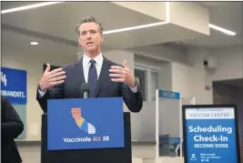  ?? JIM WILSON — THE NEW YORK TIMES ?? Newsom announces a vaccine mandate for state employees and all public and private health care workers at a Kaiser Permanente facility in Oakland on Monday.