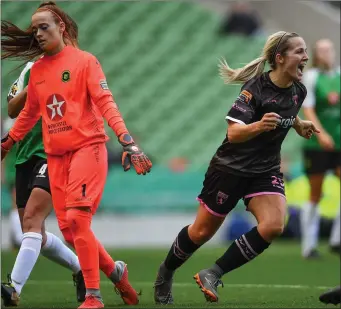  ??  ?? The goalscorer seeks out her colleague to celebrate after breaking the deadlock in the Aviva Stadium.