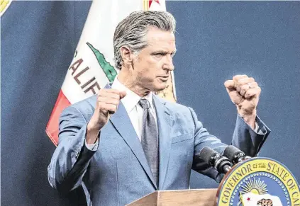  ?? HECTOR AMEZCUA hamezcua@sacbee.com ?? Gov. Gavin Newsom released his revised $288 billion budget proposal to address a $28 billion deficit on Friday.