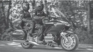  ??  ?? Putting the rider in closer to the fairing, the 2018 Honda Gold Wing is more aerodynami­c, and thus more efficient.