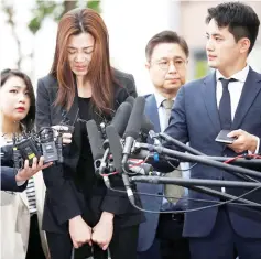  ??  ?? Cho speaking to journalist­s outside a police station in Seoul. — Reuters photo