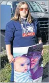  ?? CAPE BRETON POST ?? Elizabeth Murphy was among the protesters Friday at the Sydney Justice Centre for the arraignmen­t of Hayden Kenneth Laffin, 21, who is charged with obstructio­n of justice. He is charged in connection with the June 10 of 17-year-old Nathan Joneil Hanna, Murphy’s nephew, who was struck by a vehicle driven by Laffin. Murphy’s sign makes reference to Hanna’s 11-month-old daughter, Harper.