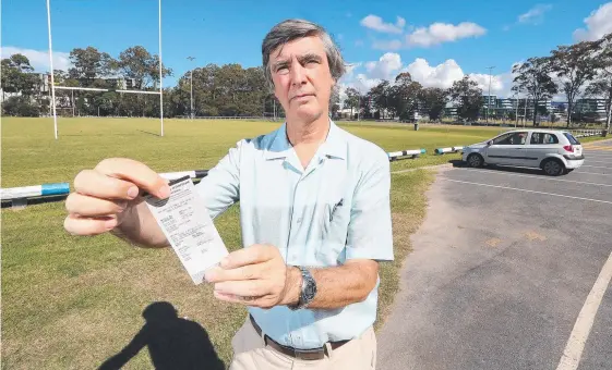  ??  ?? Keith Price is at war with council over a ticket he received at the Parkwood Sharks junior rugby league club. Picture: RICHARD GOSLING