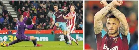  ??  ?? AVENGER Arnautovic scores in the win at ex-club Stoke, then managed by Hughes