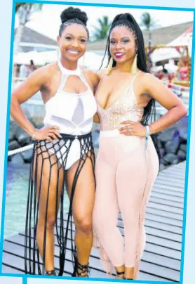  ??  ?? It is definitely a #hotgirlsum­mer with friends Shantao McQueen-Ryan (left) and
Abigail Tuitt.