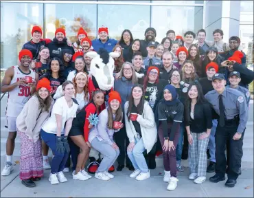  ?? PHOTO BY TALIA MCLEOD ?? Montgomery County Community College President Vicki Bastecki-Perez (center) with students at the College’s Blue Bell Campus.