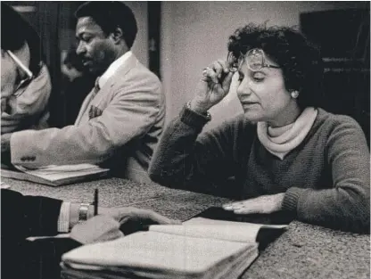 ??  ?? Miriam Balanoff, who served two terms in the Illinois House, files her nominating petitions in December 1983 in a bid for the 10th Ward committeem­an seat of her rival, Aid. Ed Vrdolyak.