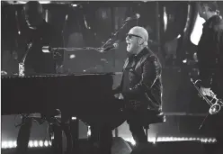  ?? ?? Billy Joel performs in “The 100th: Billy Joel at Madison Square Garden”