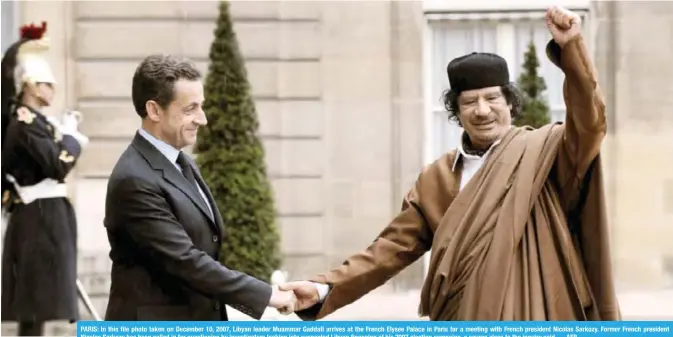  ??  ?? PARIS: In this file photo taken on December 10, 2007, Libyan leader Muammar Gaddafi arrives at the French Elysee Palace in Paris for a meeting with French president Nicolas Sarkozy. Former French president Nicolas Sarkozy has been called in for...