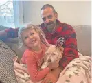  ?? PROVIDED BY ELIZABETH HOUMAN ?? Elizabeth and Mehrad Houman’s dog, Mishka, went missing from San Diego in July. She was found near Detroit last week.