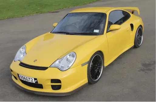  ??  ?? While clearly from a new generation entirely from the 964, the 996 GT2 still is unmistakab­ly 100% 911