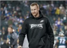  ?? THE ASSOCIATED PRESS FILE ?? Eagles quarterbac­k Carson Wentz admitted Monday that the broken bone in his back that cut his season short has not fully healed.