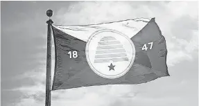  ??  ?? COURTESY OF THE ORGANIZATI­ON FOR A NEW UTAH FLAGSalt Lake City: The state flag could get a makeover under a proposal before the state legislatur­e. The privately funded Organizati­on for a New Utah Flag claims the majority of Utahns do not identify with the current flag. Jonathan Martin, a member of the group and flag designer, says the beehive on its proposed flag represents industry. The white portion represents snow-capped mountains in Northern Utah, while the red stands for Southern Utah’s red rocks. The blue on either side represents the Great Salt Lake and tradition. The year 1847, when the Mormon pioneers originally settled in Utah, is also represente­d on the flag.