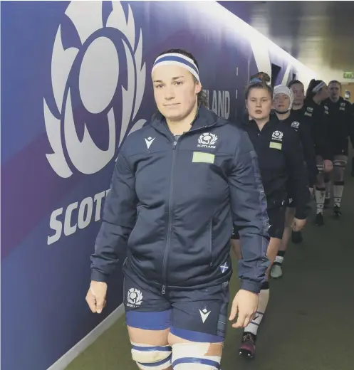  ?? PICTURE: ROSS MACDONALD/SNS/SRU ?? 0 Scotland captain Rachel Malcolm leads her team out to face England at Murrayfiel­d in February.