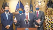  ?? JOSE F. MORENO/AP ?? A Republican-crafted bill to ban so-called COVID-19 vaccine passports in some cases and to restrict the health secretary’s actions during health emergencie­s was vetoed Thursday by Gov. Tom Wolf, shown here in a file photo.