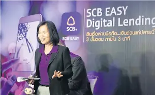  ??  ?? Apiphan Charoenanu­sorn, SCB’s senior executive vice-president and head of operations, unveils SCB Easy Digital Lending. As part of the SCB Easy app, the service is expected to expedite the loan applicatio­n process.