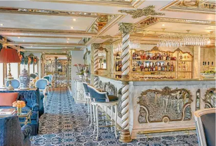  ?? PHOTO: UNIWORLD ?? The salon on the SS Maria Theresa where guests gathered in the evening.