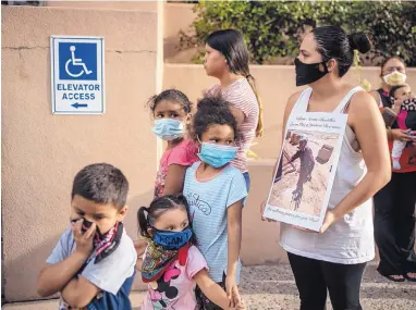  ?? ROBERTO E. ROSALES/JOURNAL ?? Protesters gather outside APD headquarte­rs Thursday evening to speak out against police brutality. Around 100 people attended, including relatives of Valente Acosta-Bustillos, who was shot and killed by police during a welfare check in March.