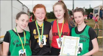  ??  ?? Under-16 Girls 200m competitor­s who were presented with their medals, from left: 3rd Kate Hennessy (Spa/Fenit/Barrow), 1st,Aoife Kerins (Castleisla­nd),2nd Emma O’Regan (Kenamre) and 4th Blaithin McKenna (Spa/Fenit/Barrow).