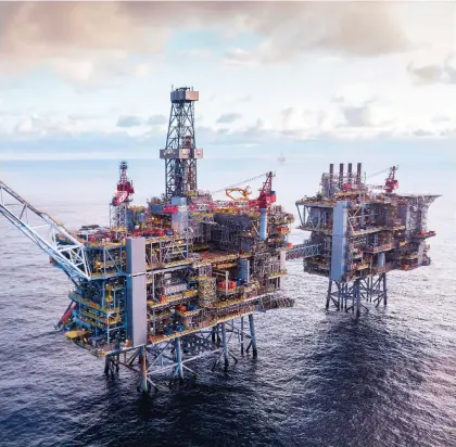  ?? STUART CONWAY/AFP/GETTY IMAGES FILES ?? An oil platform in BP’s Clair Ridge oilfield in the North Sea, off the coast of Scotland. Futures slipped below US$60 in London on Friday and ended the week down about 12 per cent, the worst showing since January 2016.