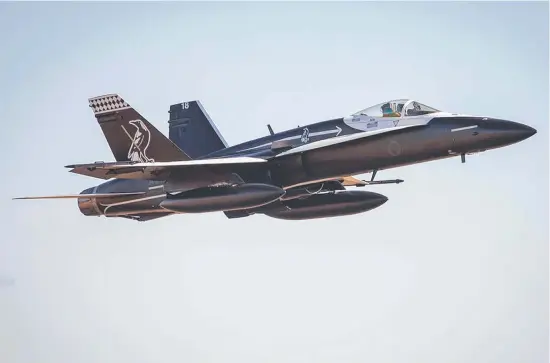  ??  ?? A single Royal Australian Air Force F/A-18A/B Hornet aircraft from RAAF Base Tindal’s No.75 Squadron will conduct a 10-minute aerobatic handling display over Darwin in support of Territory Day celebratio­ns.