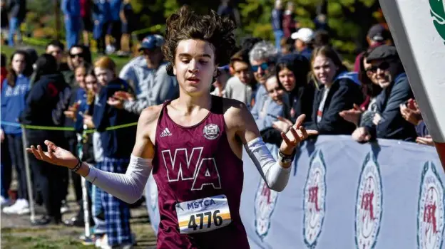  ?? MARK STOCKWELL FOR THE GLOBE ?? In his run up to winning the Division 1 title at Devens, Westford Academy’s Paul Bergeron was first to the line at the Bay State Invitation­al.