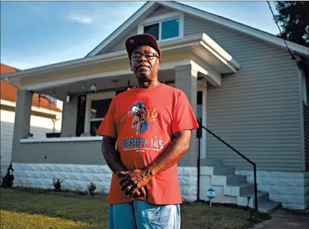  ?? MICHAEL BLACKSHIRE/THE NEW YORK TIMES ?? Christophe­r T. Smith, seen on July 20, bought his home for $86,000, in Louisville, Kentucky. Affordable homes can be hard to buy because lenders don’t make much money on small loans, but small-dollar mortgage programs can help.