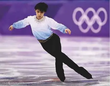  ?? AFP ?? Japan’s Yuzuru Hanyu competes in the men’s single skating short programme of the Winter Olympics figure skating event at the Gangneung Ice Arena yesterday.